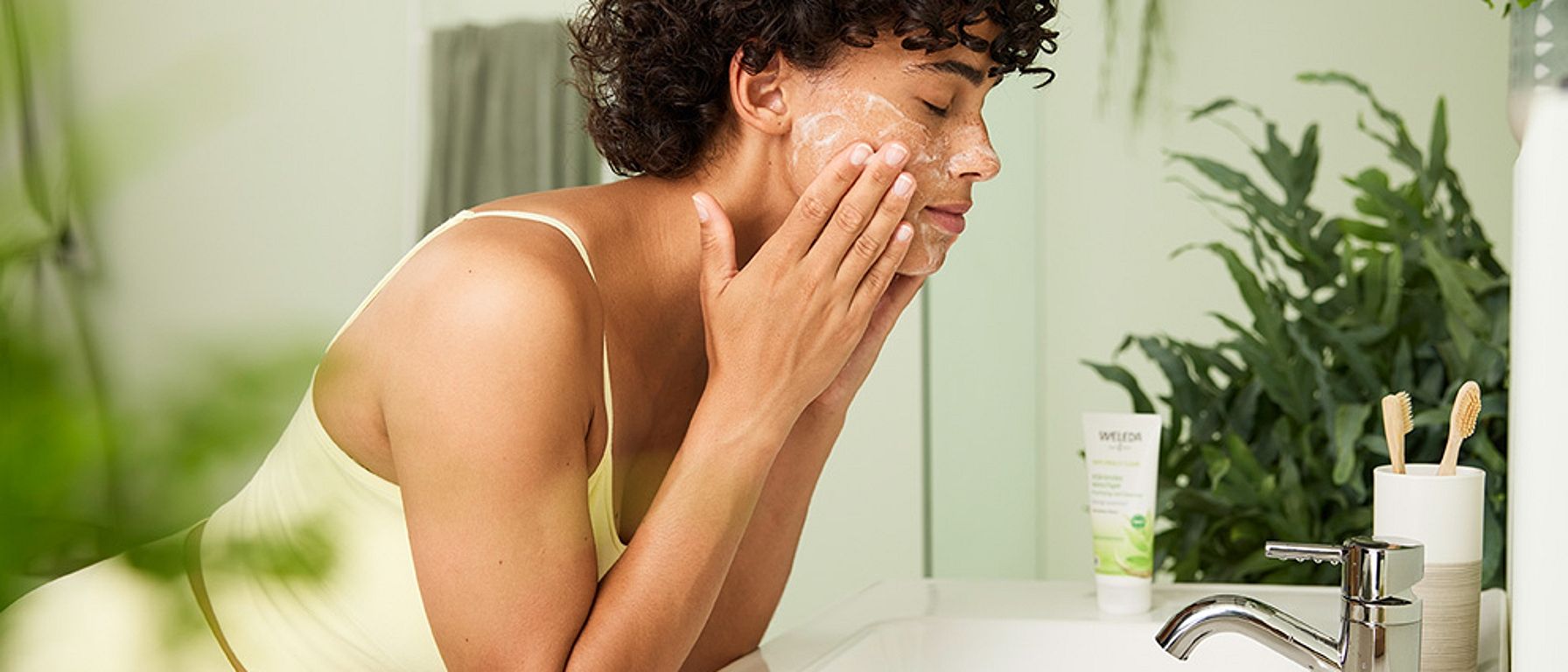 women cleaning her face