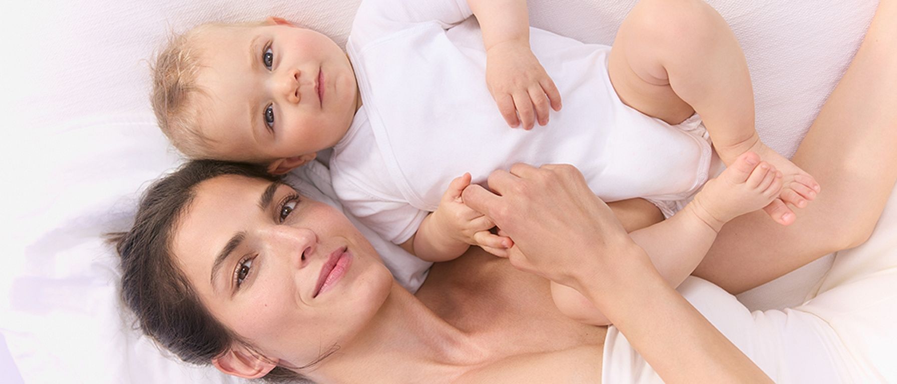 mother and baby lying down