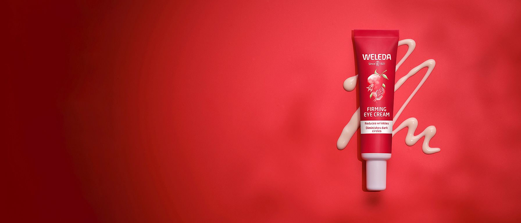 Firming eye cream on marble