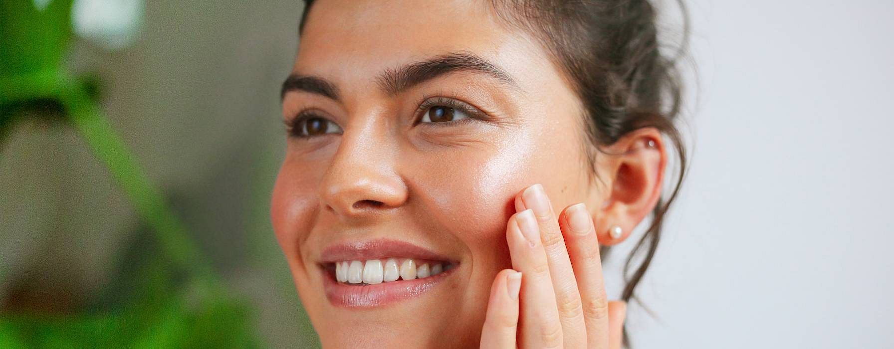 Woman touching her face