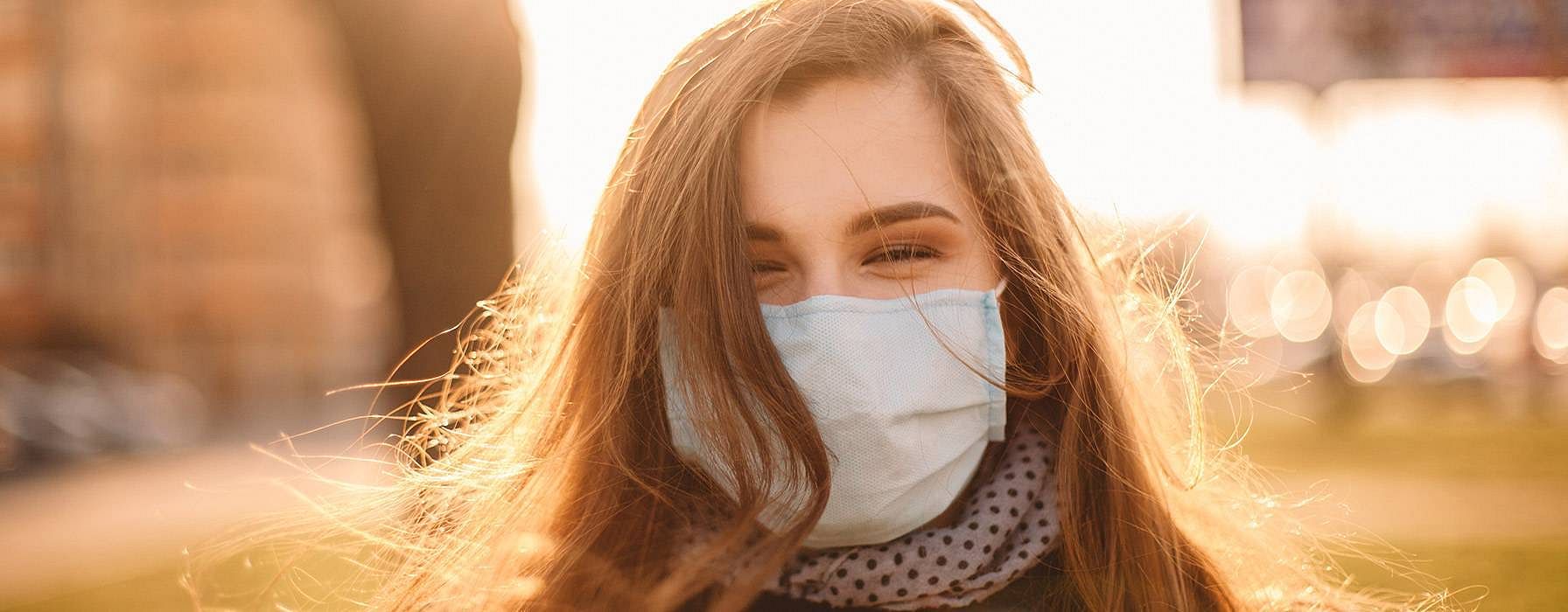 woman wearing a mask