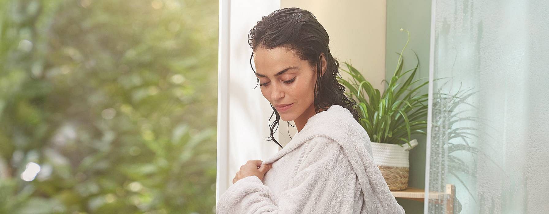 Woman in a bath robe.
