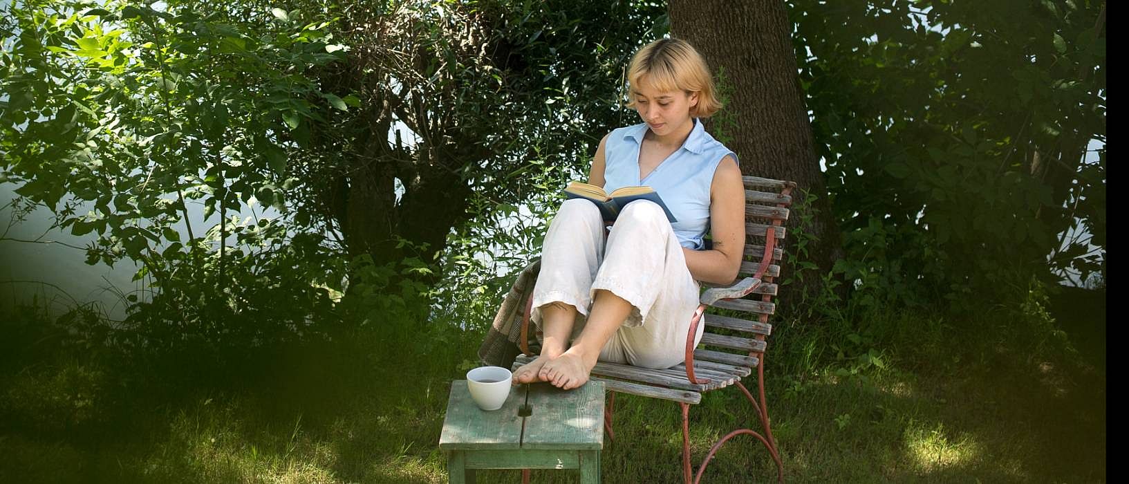 Woman sitting in shade