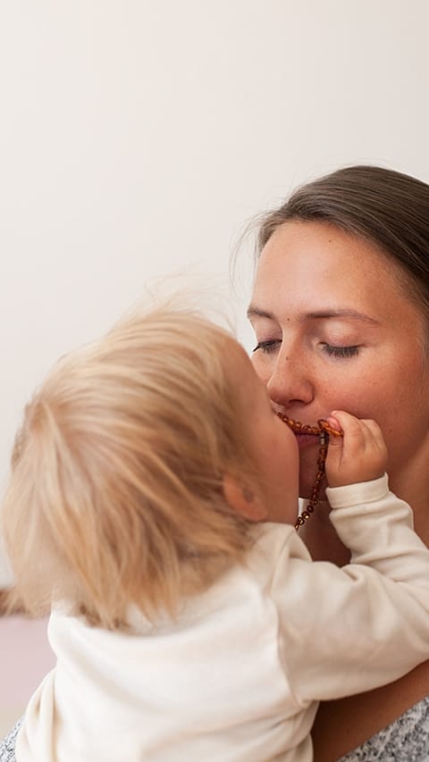 mother and baby embracing