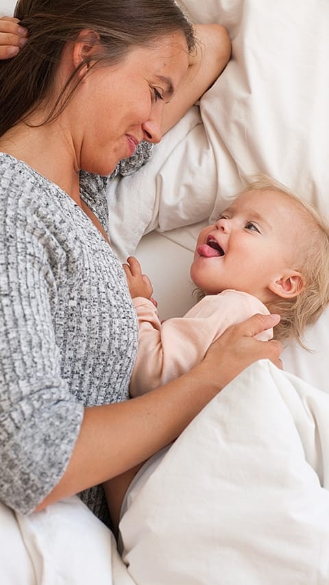 baby sticking out tongue