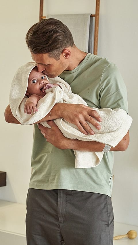 Father holding a baby