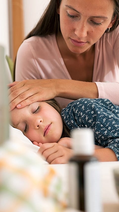 Mother strokes sick child