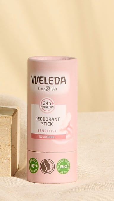 Deodorant Stick Sensitive infront of a sandy coloured background.