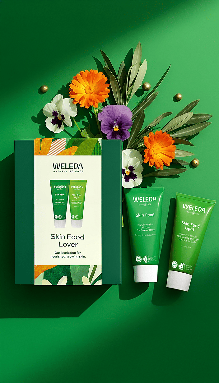 Skin Food Lover Gift Set on green surrounded by background calendula and viola flowers