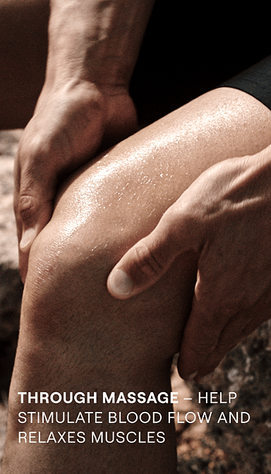 man massaging his leg with text.