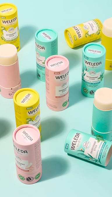 Deodorant Sticks group shot open tops against turquoise background.