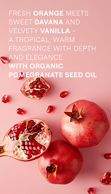 Inspire Body Wash ingredients text on pink background surrounded by pomegranate fruit.