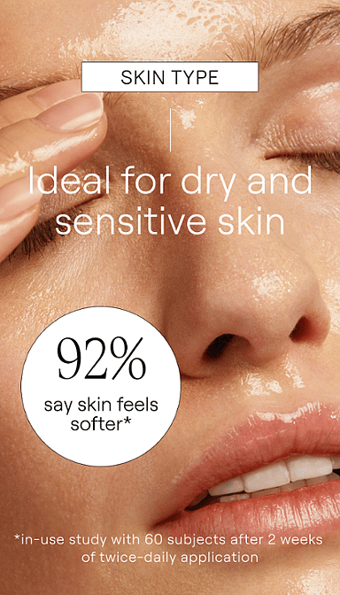 Woman's face with eyes closed using Make-up Removal Cleansing Oil and skin type text for dry and sensitive skin.