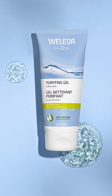 100ml purifying gel cleanser tube with blue background and texture