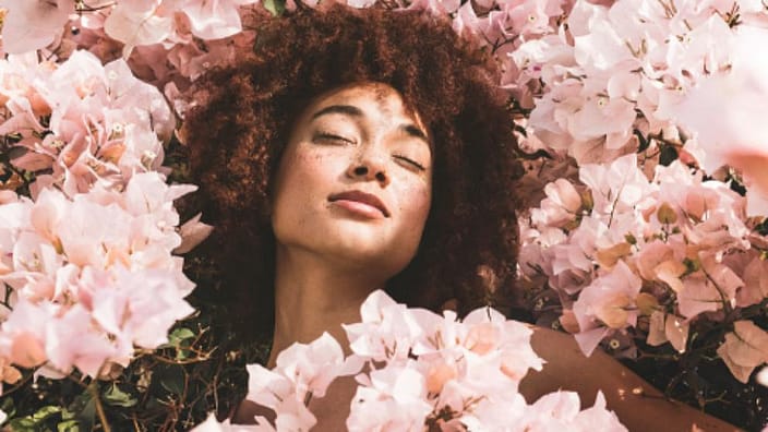 Woman and pink flowers