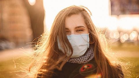 woman wearing a mask