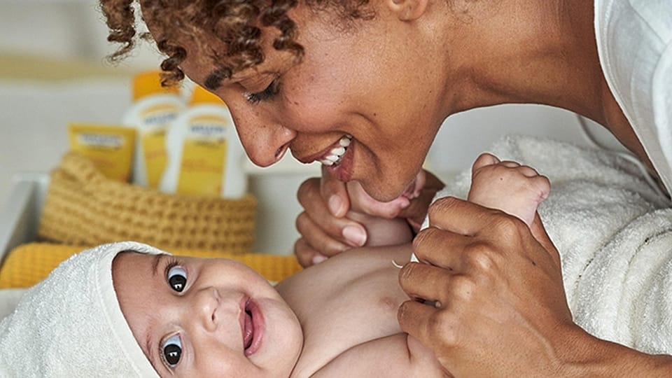 mother and baby having fun