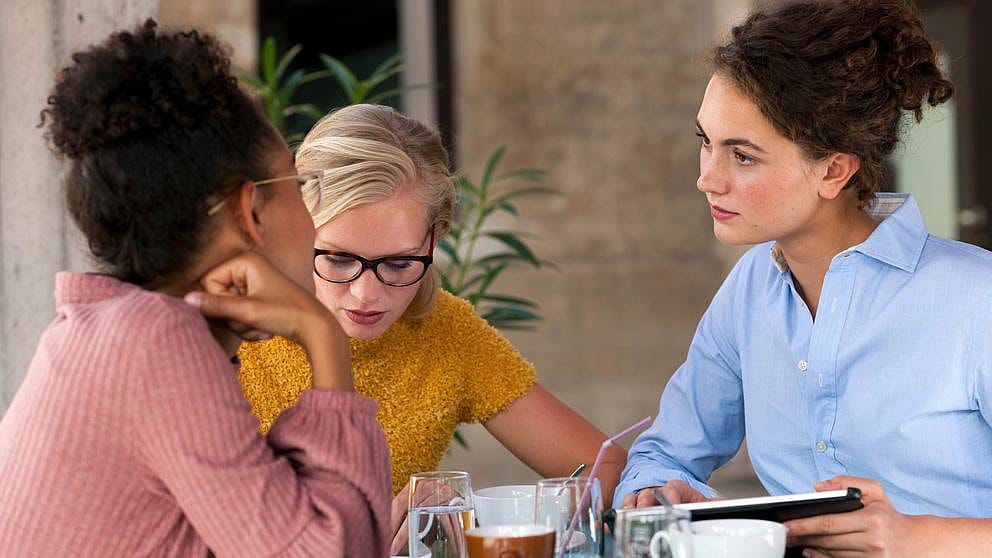 three girls working on something