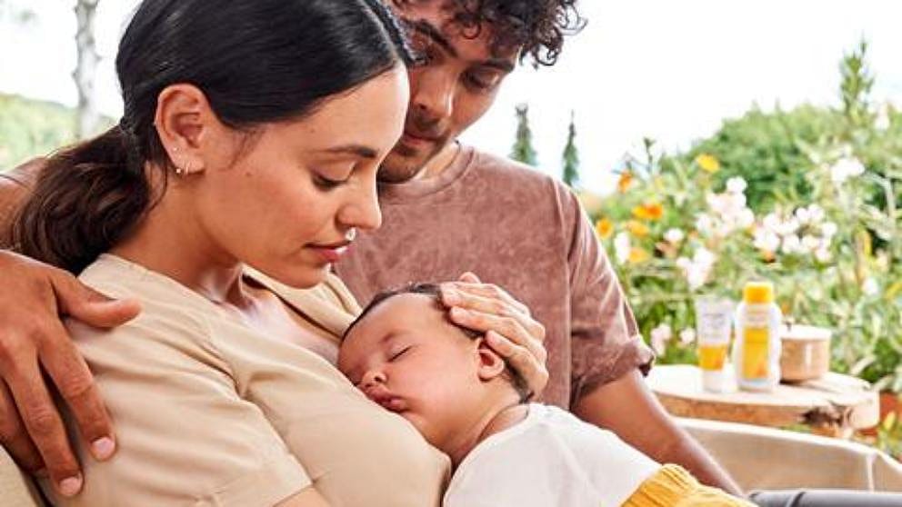 mother, father and baby