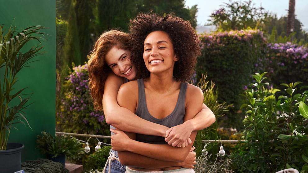 Two women hugging