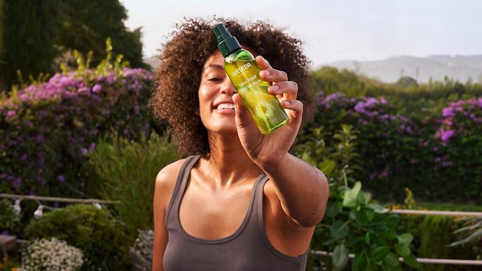 Woman showing spray