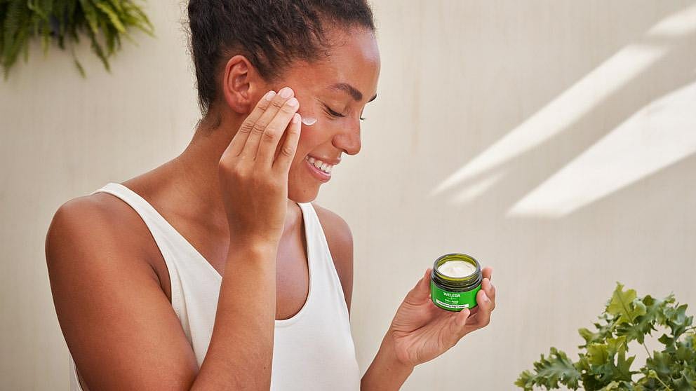 woman applying Skin Food Nourishing Night Cream