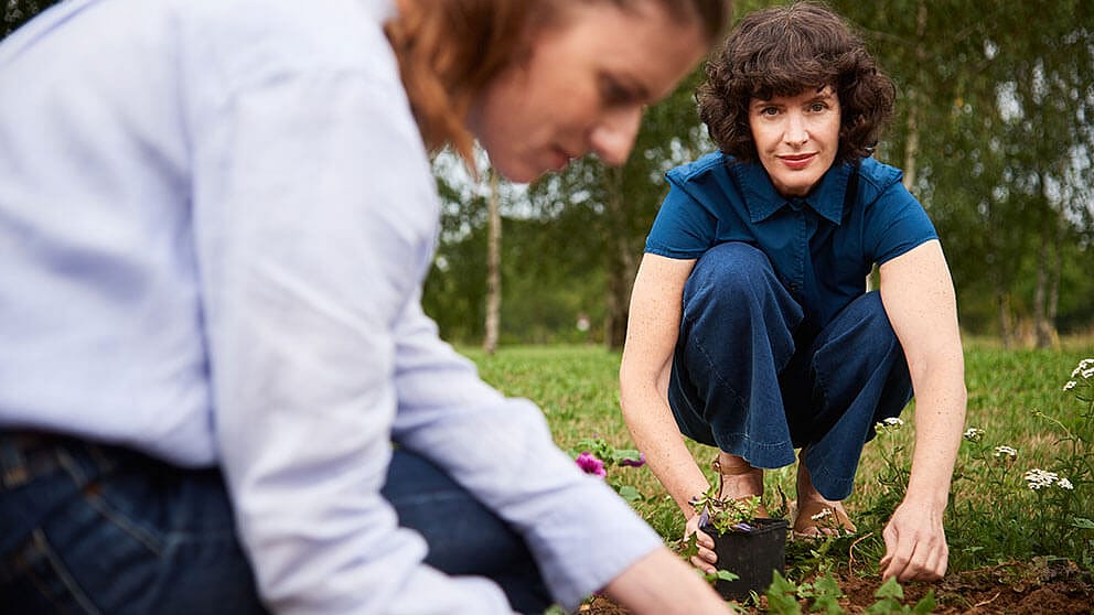 Women working in the garden.
