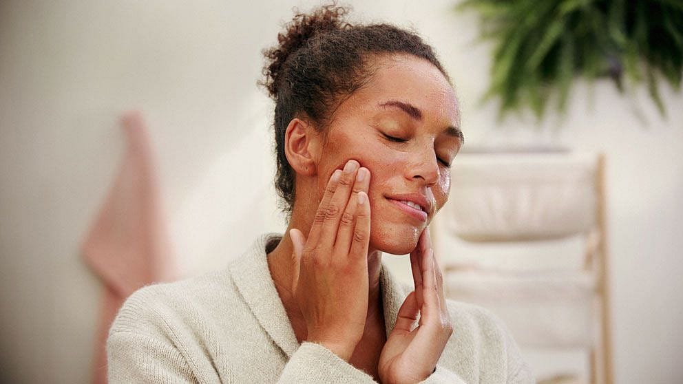 woman touching face