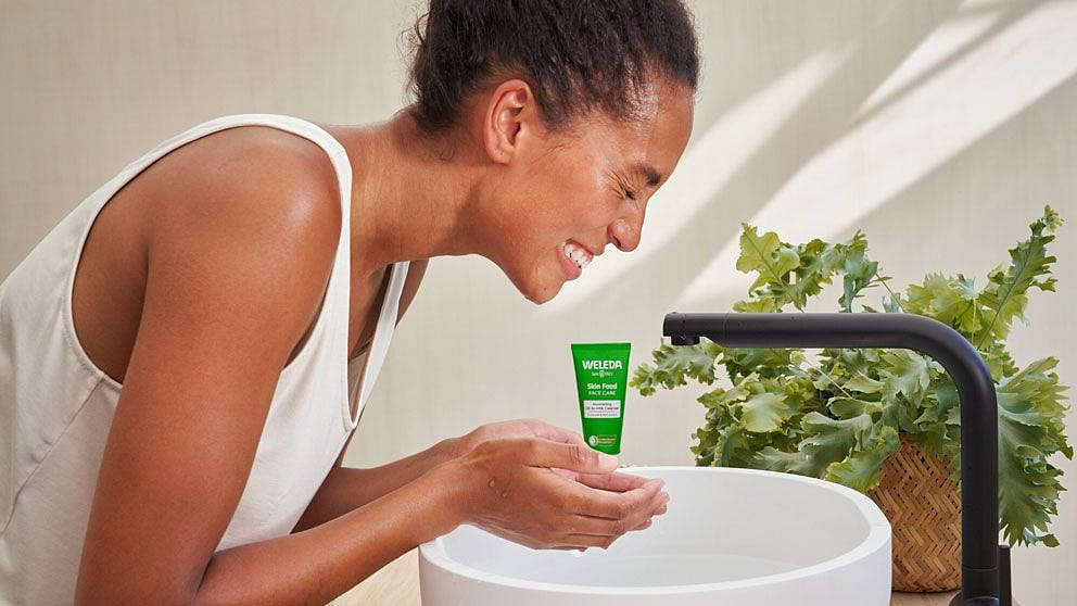 Woman washing face