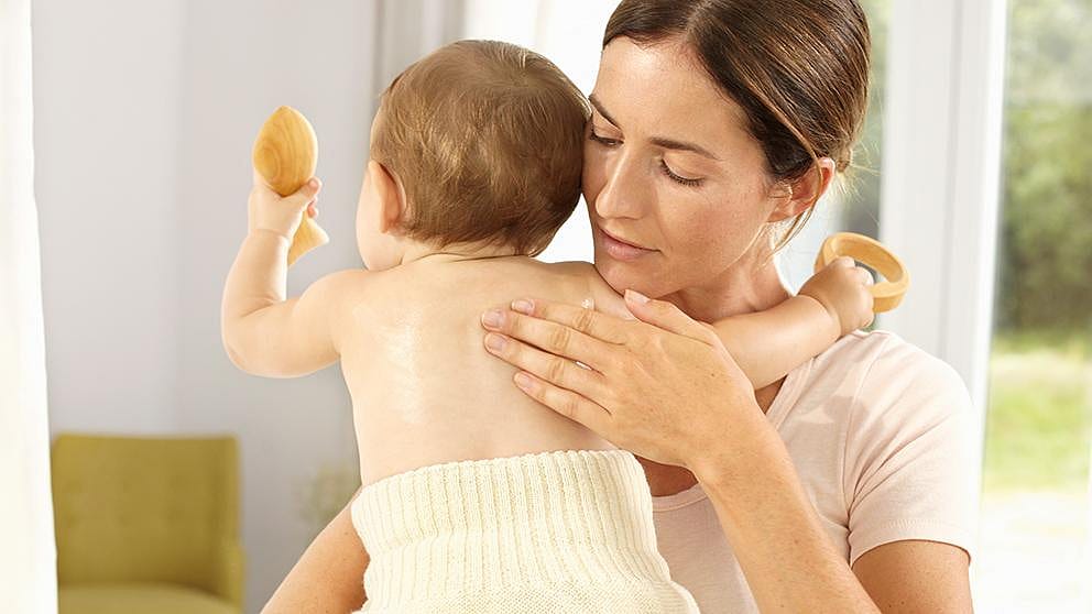 mothrt holding baby