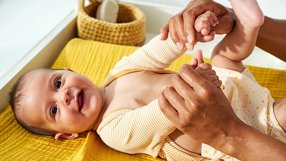 Baby smiling on change table