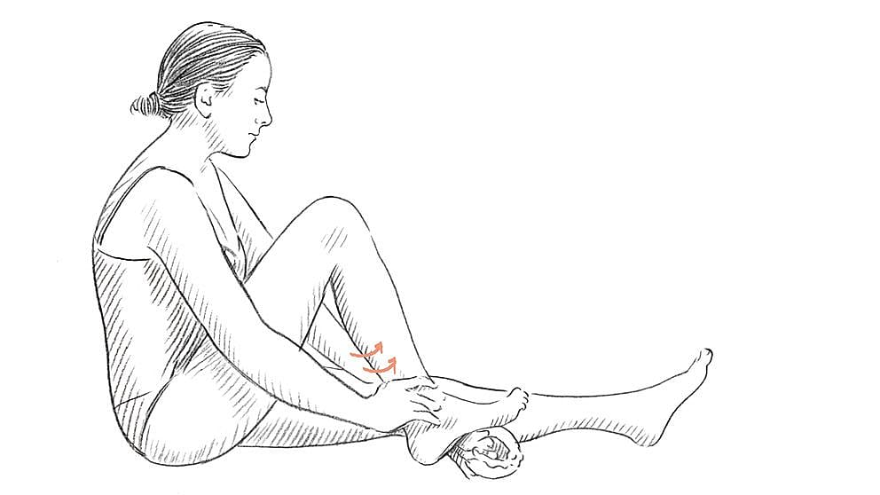 Drawing of a person seated on the floor with a towel under their right foot moving it backwards and forward