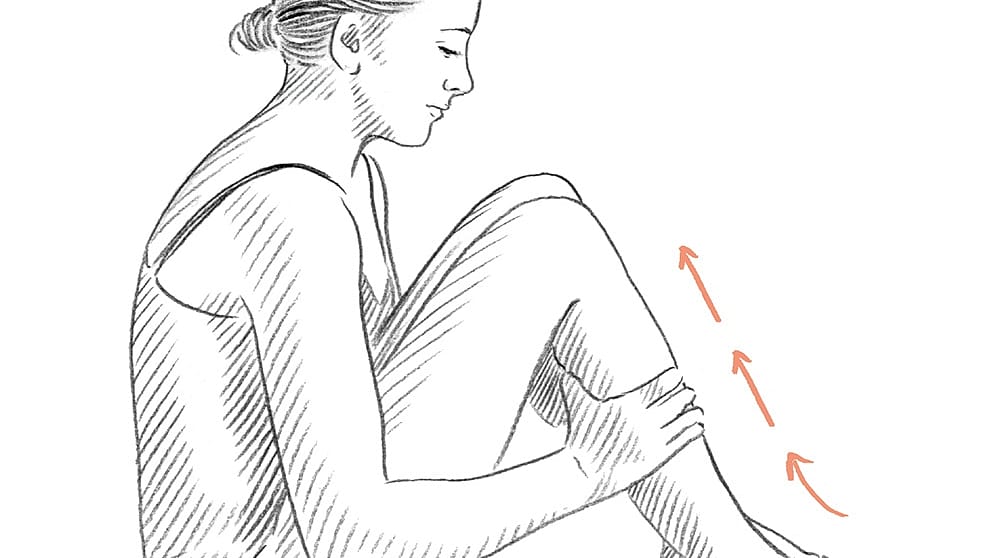 Drawing of a person seated on the floor massaging their leg upwards